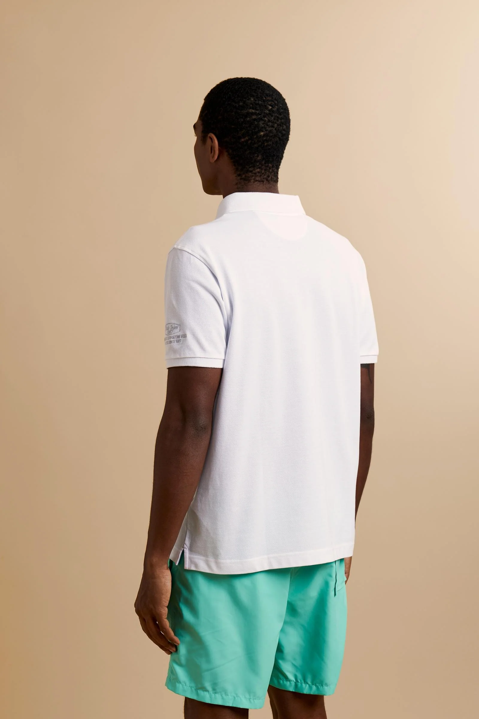 Herren Kurzarm-Poloshirt aus Piqué Kollektion Nations - Charo - Image 4